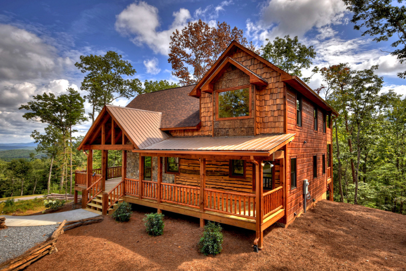 multi-level cabin with a spacious patio.